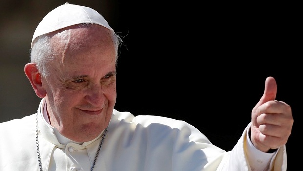 Pope Francis gives his thumb up as he leaves at the end of his weekly general audience in St. Peter's square at the Vatican, Wednesday, Sept. 4, 2013. (AP Photo/Riccardo De Luca)